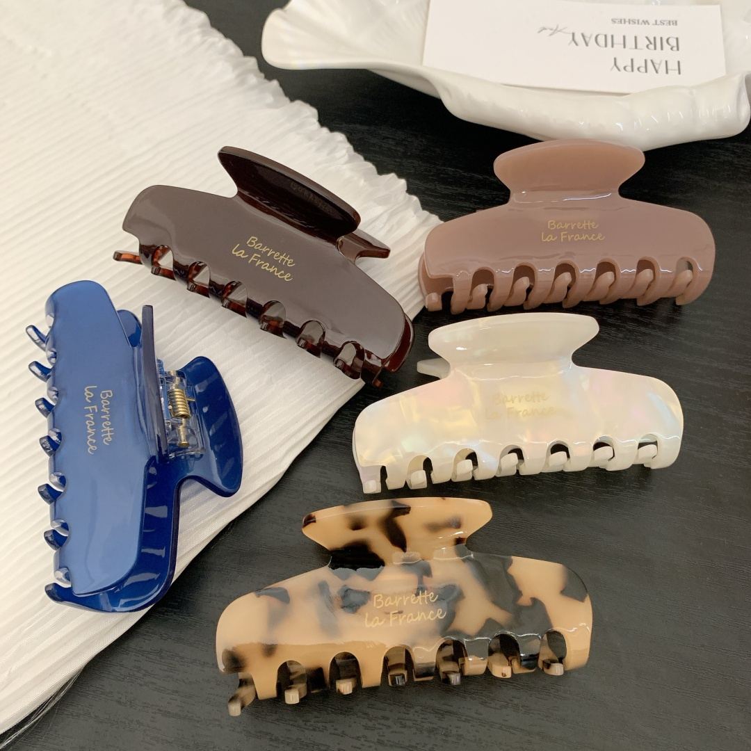 ¿Por qué la pinza tipo garra de tiburón de acetato de celulosa retro francesa de 8,3 cm es imprescindible para las marcas modernas de accesorios para el cabello?